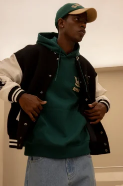 VARSITY OVER FIT HOODIE